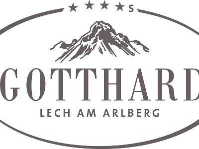Schwarz-weißes Logo mit einem stilisierten Berg und dem Text "Gotthard Lech am Arlberg". Darüber vier Sterne, alles in einem ovalen Rahmen angeordnet.