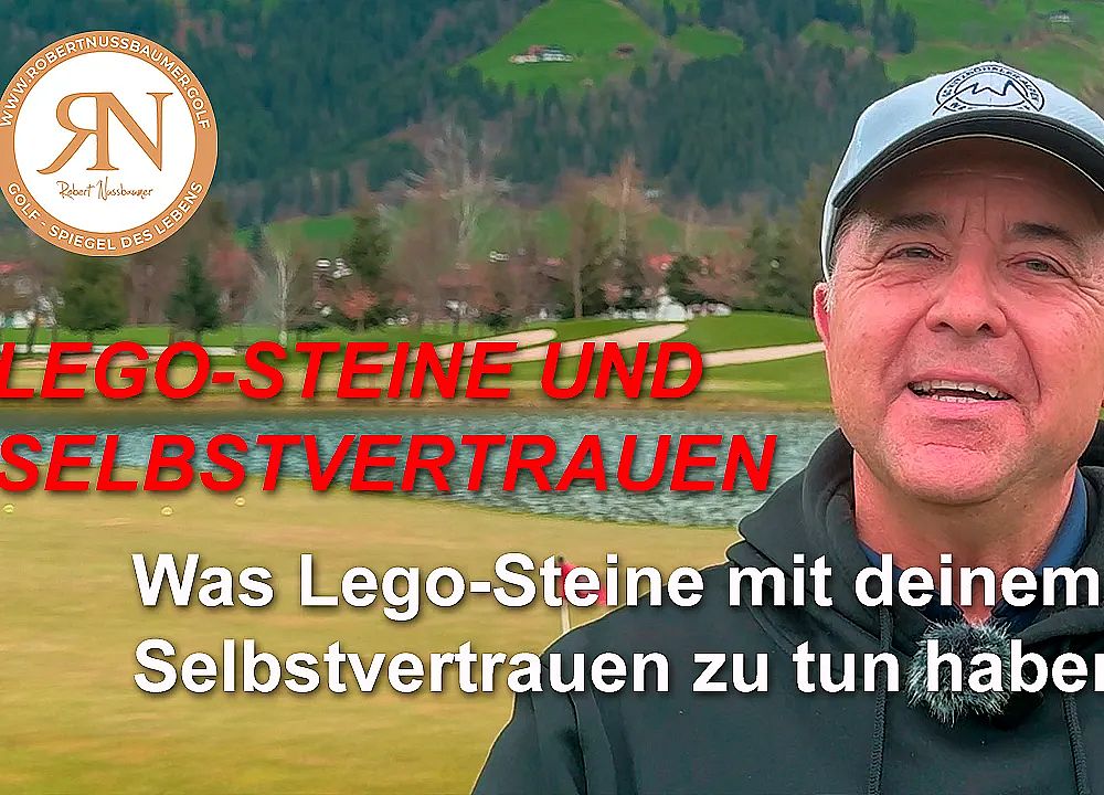 A man in a cap stands on a golf course with mountains behind. Text overlay discusses Lego bricks and self-confidence connections.