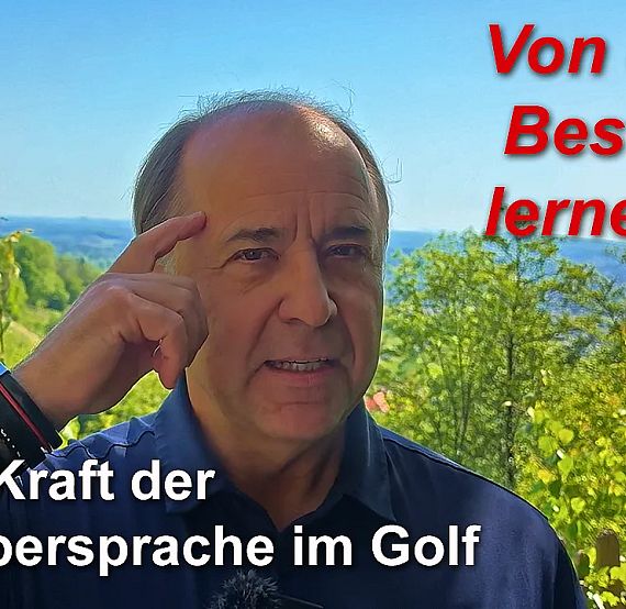 Man outdoors gesturing near his temple, discussing body language in golf, with trees and sky in the background.