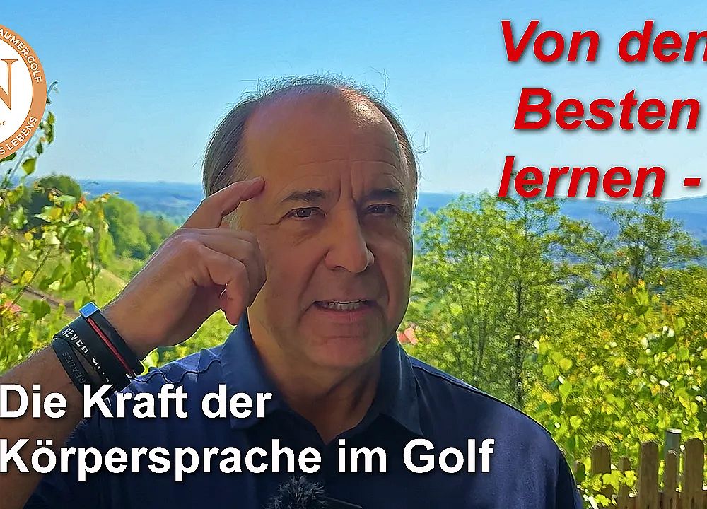 Man outdoors gesturing near his temple, discussing body language in golf, with trees and sky in the background.