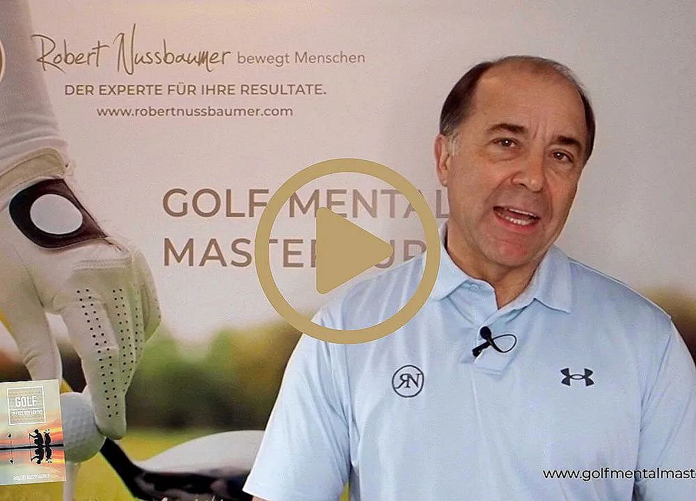 A man in a light blue shirt talks about golf mental mastery in front of a promotional banner.