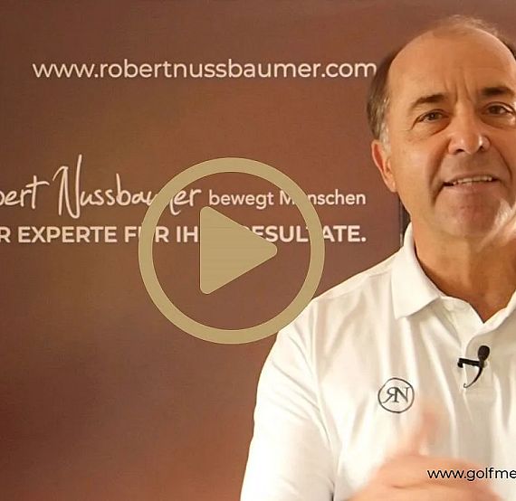 Man in a white polo shirt in front of a brown backdrop with promotional text, featuring a play button overlay.