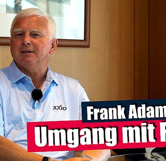 An older man in a light blue shirt sits in an office setting, likely during an interview. There's a text overlay discussing handling frustration in golf.