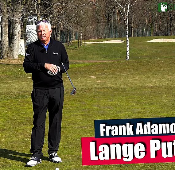 A man stands on a golf course holding a club, with text about long putts. Trees and sand traps are visible in the background under a clear sky.