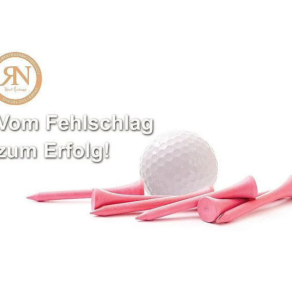 Golf ball surrounded by pink tees with text: "Vom Fehlschlag zum Erfolg!" A motivational message about turning failures into success.
